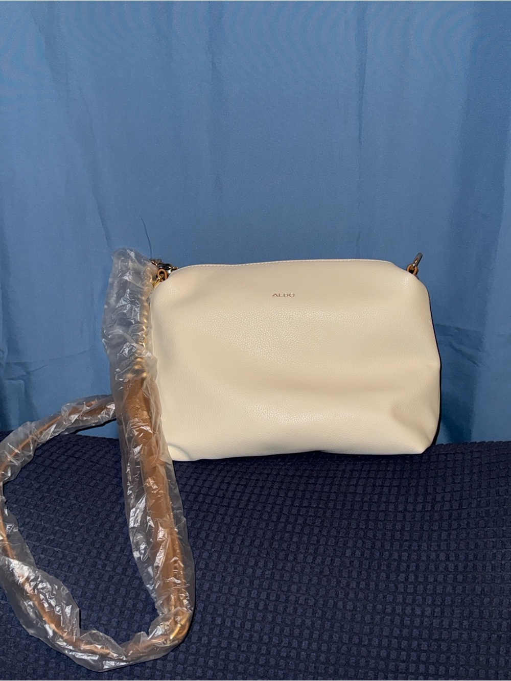 Aldo Off-White Pebbled Crossbody Bag with Gold Hardware